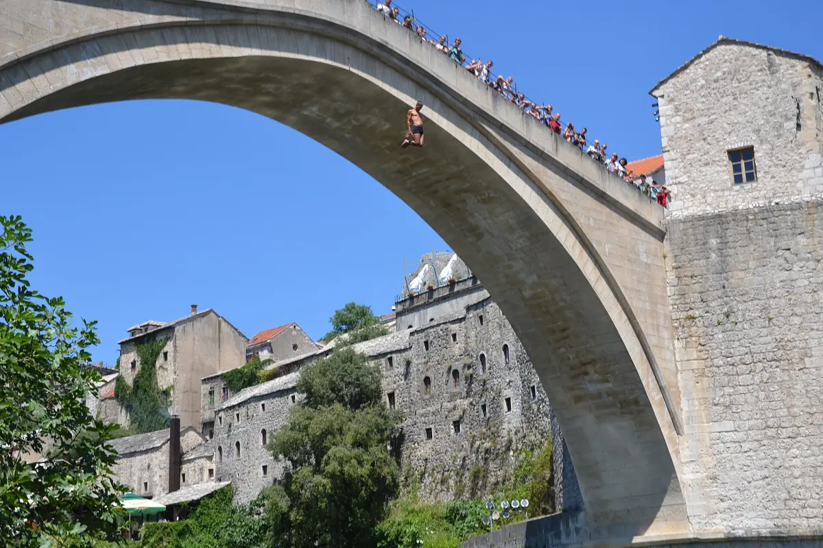 A diver jumping from the Old Bridge in Mostar